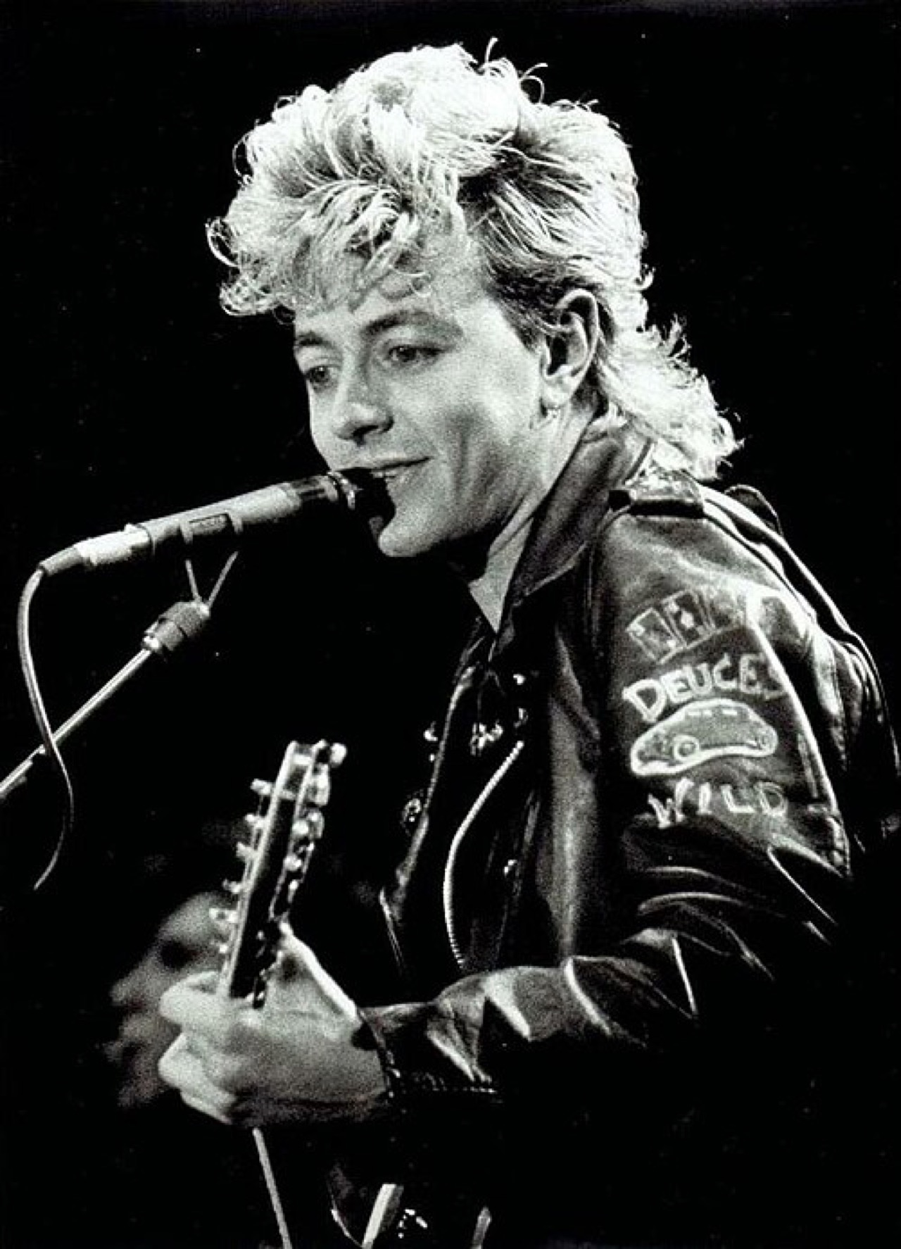 "Like I am wearing a pair of gloves when I try to play." Then Brian Setzer got his hands back